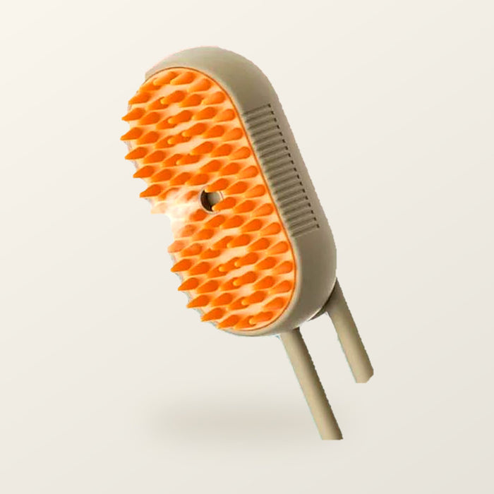 The shed brush: steam grooming brush with orange silicone bristles and a cream body, on a warm cream background