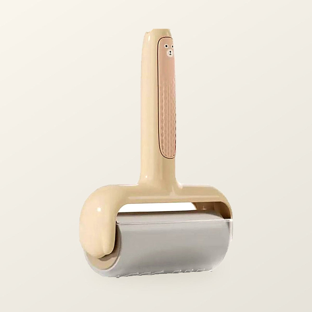 Wide sticky lint roller with a cream bear-shaped handle and a ten centimetre drum, on a warm cream background